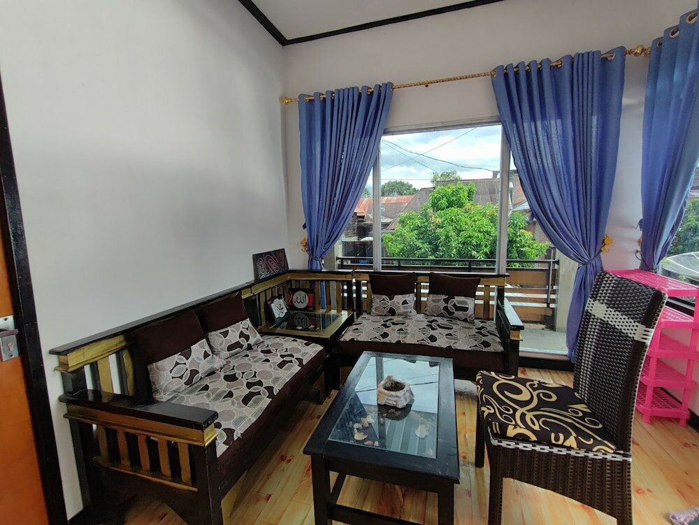 Фото Oyo 92357 Zzip Homestay