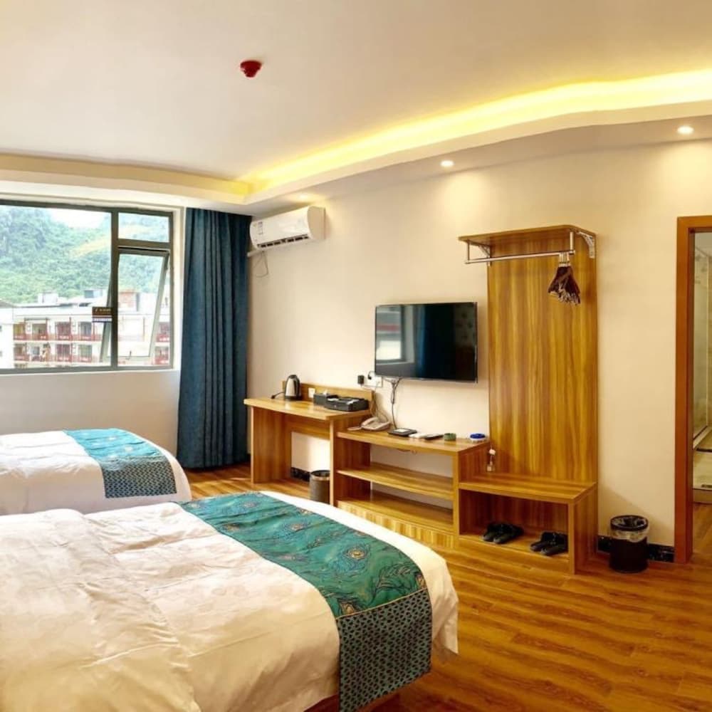 Фото Yangshuo Qingyunge Hotel