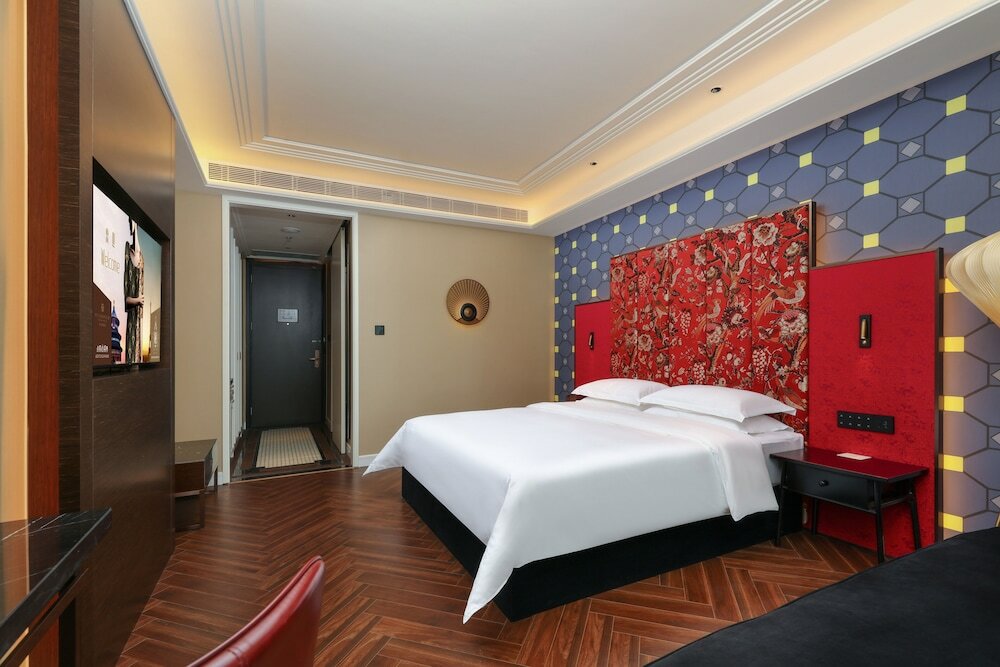 Фото Tiegang Jinjiangduchengjiudian