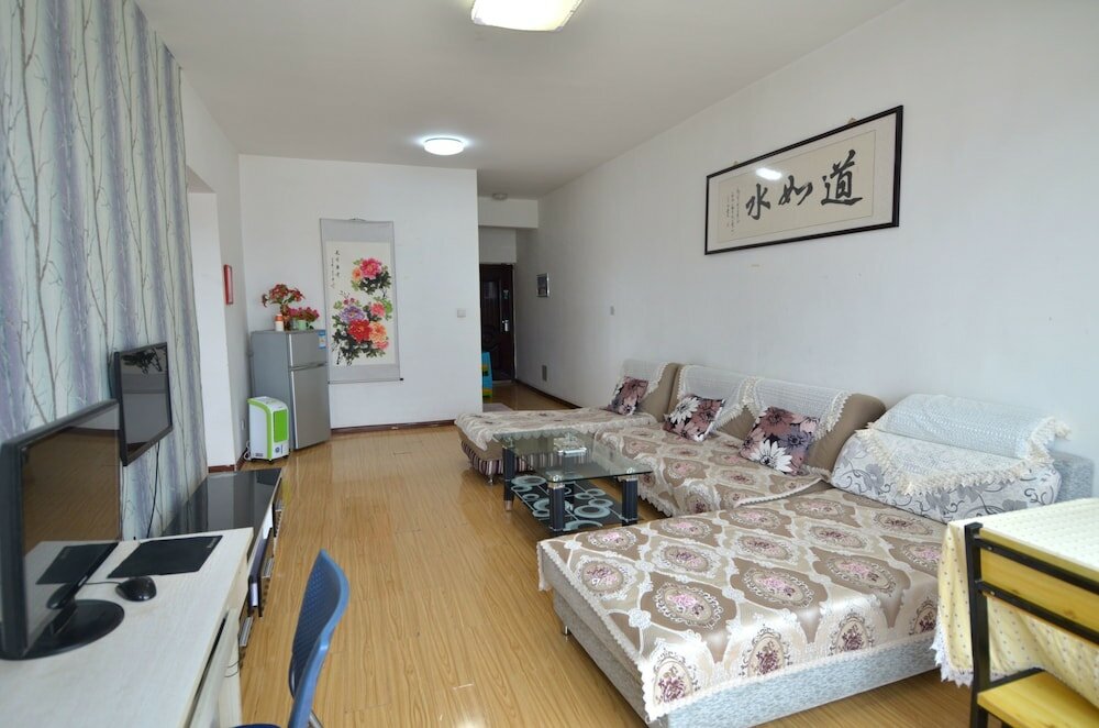 Фото Lanzhou Longshang Mingzhu Apartment Three-bedroom suite