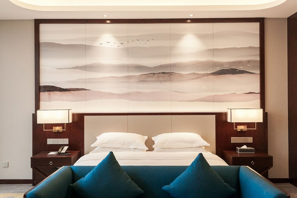 Фото Jinyi Jinglan Hotel