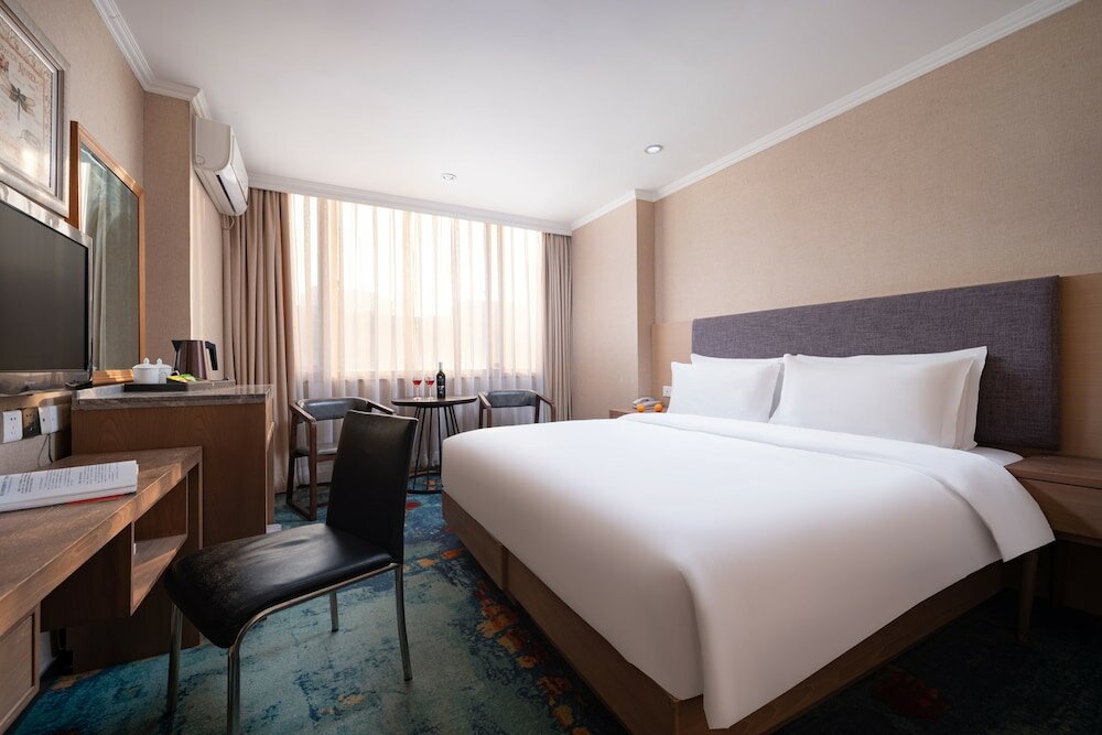 Фото Kaiserdom Hotel Guangzhou Ouzhuang