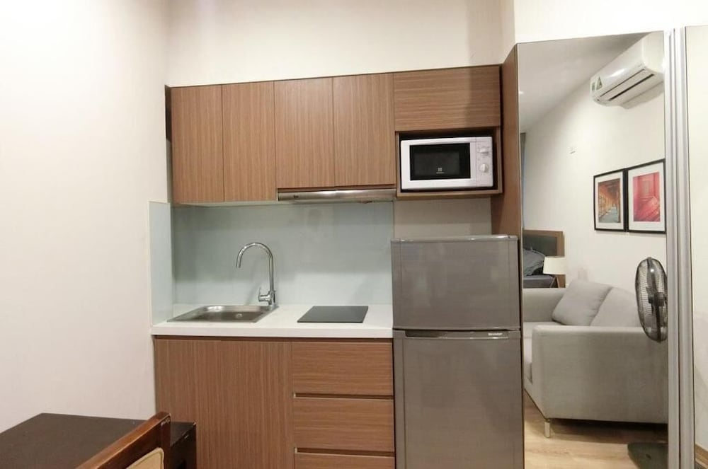 Фото Lotus Inn Serviced Apartment