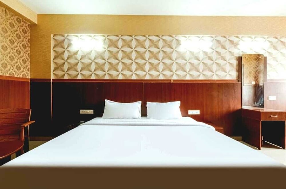 Фото Mysore Mayflower Hotel