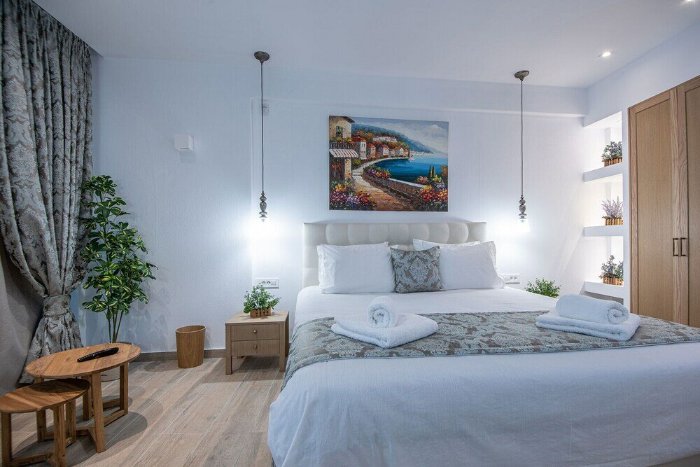 Фото Ammos Luxury Suites