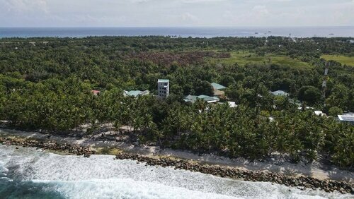 Гостиница Equator Retreat на Атолле Гнавийани