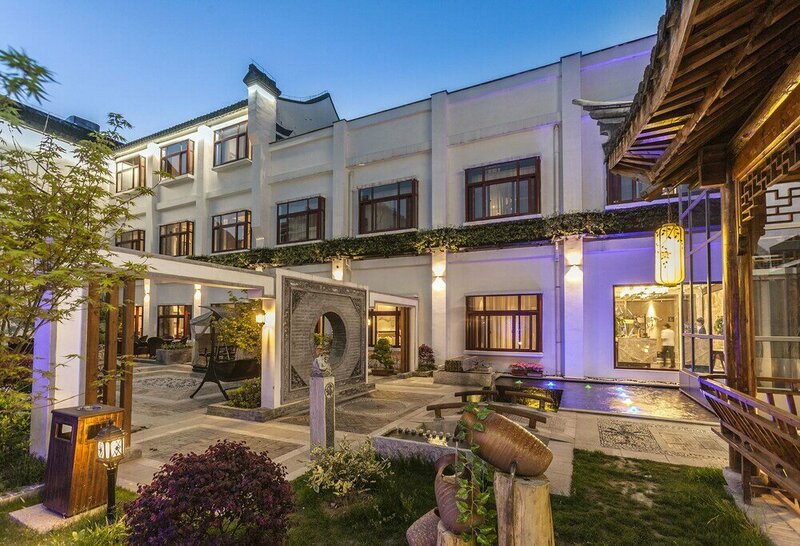 Гостиница Hejing Chengshang Generations Hotel