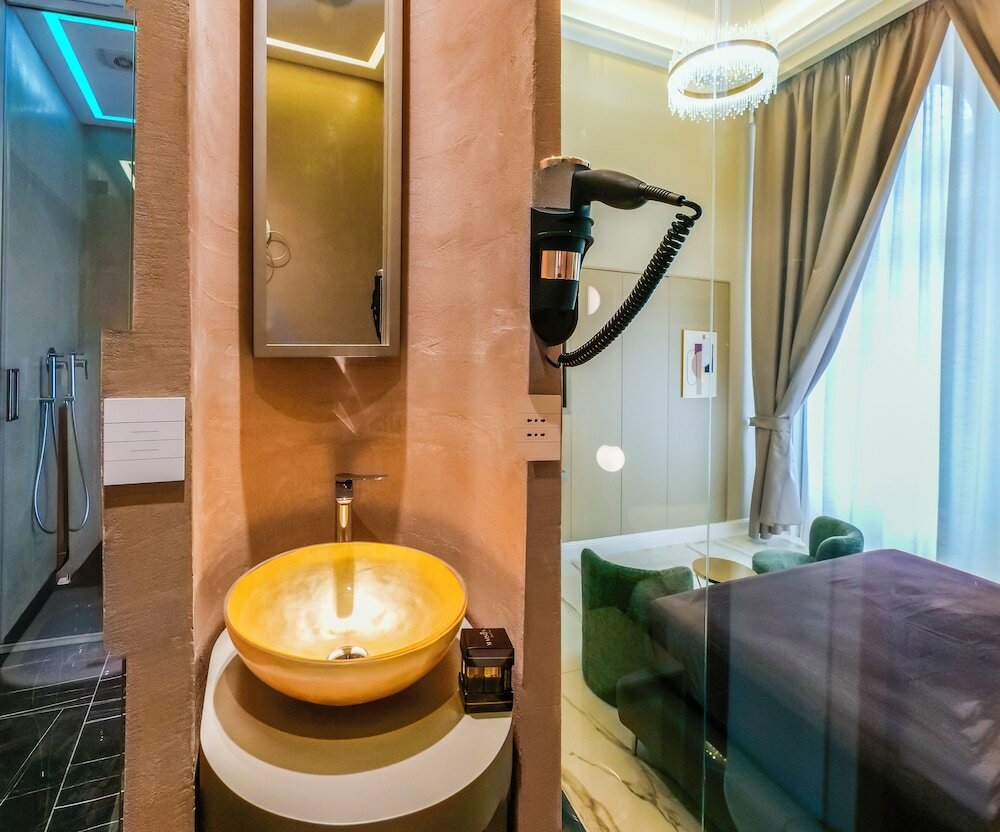 Фото Maison San Carlo Luxury Suites