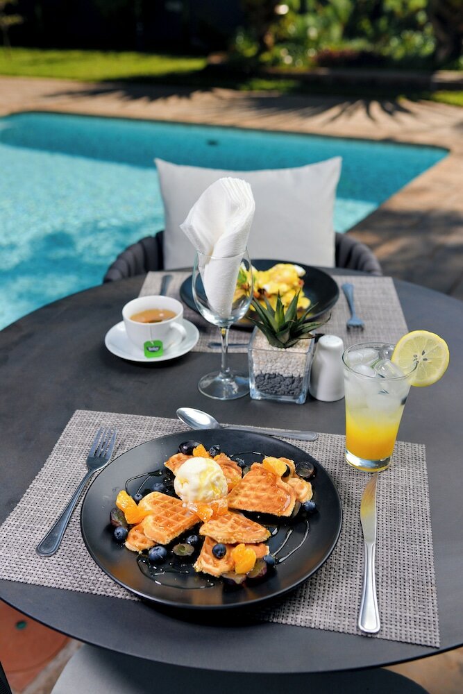 Фото Ezulwini Villa Hotel