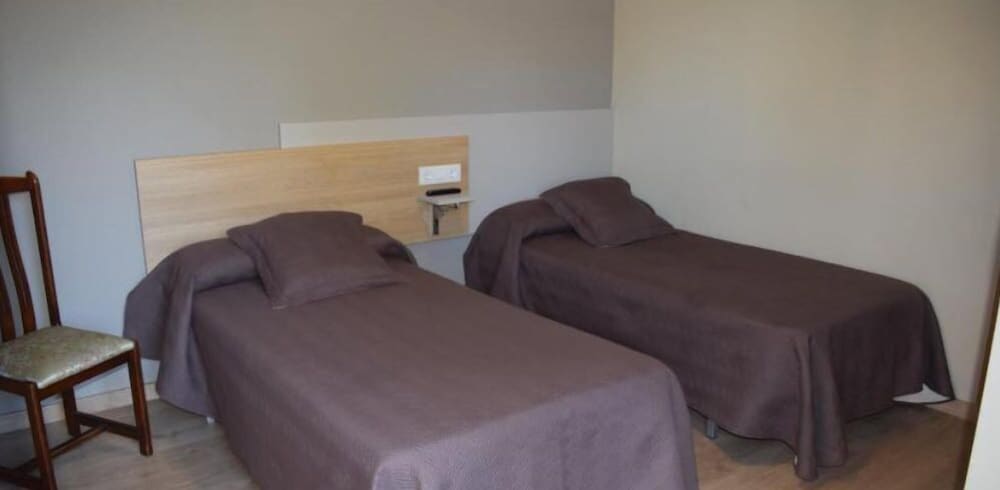 Фото Pensión Albergue Los Caminantes - Hostel