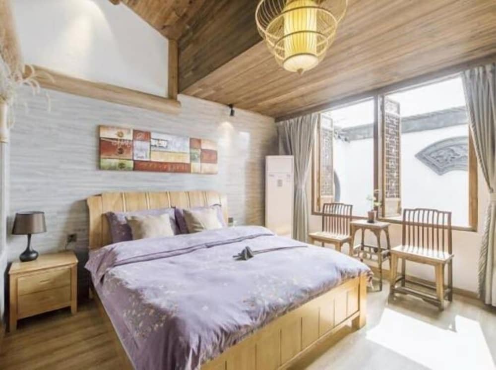 Фото Zhuozheng Xiangshu Inn