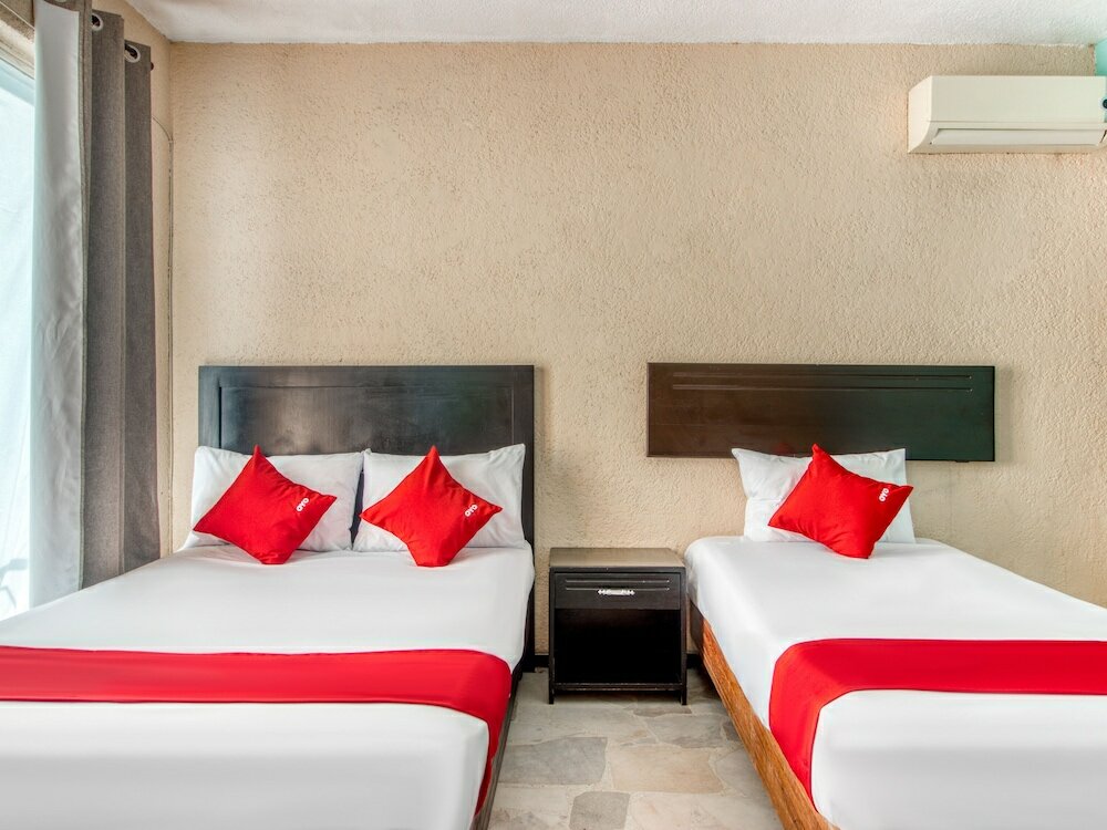 Фото Capital O Hotel La Siesta, Gómez Palacio