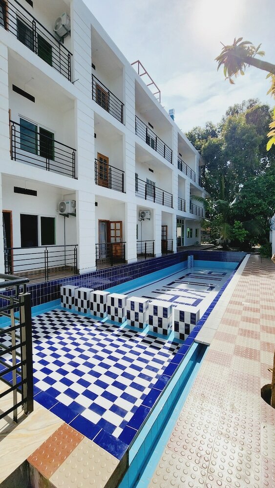 Фото Pulickal Heights Hotel