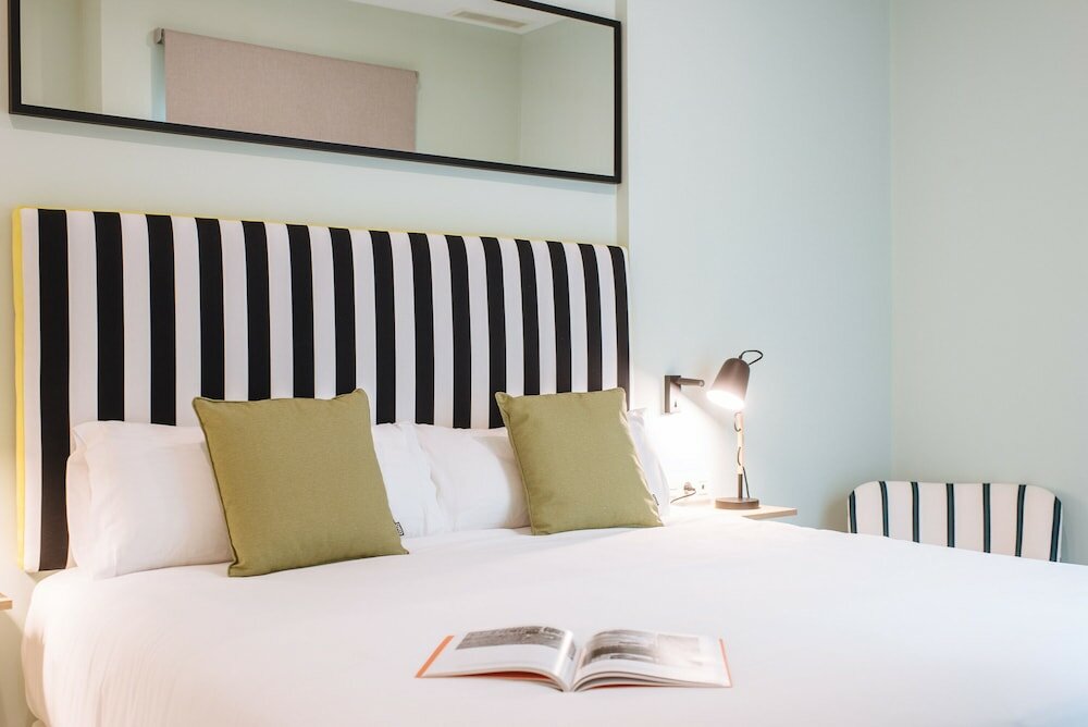 Фото Sercotel Sevilla Guadalquivir Suites