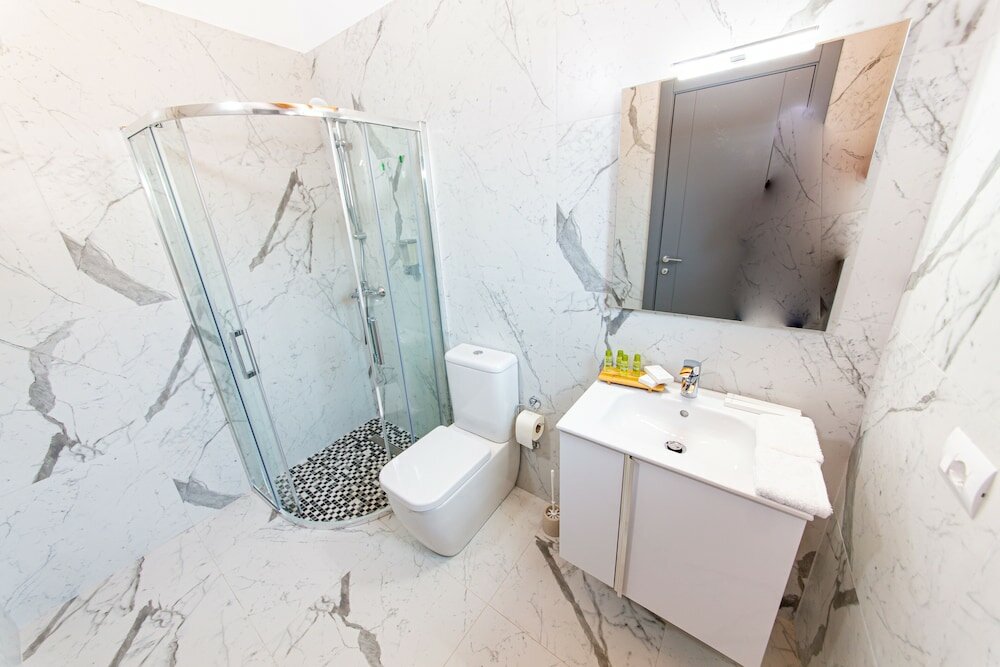 Фото Santa Oliva Suites