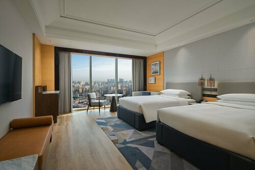 Гостиница Sheraton Shanghai Pudong Riverside в Шанхае