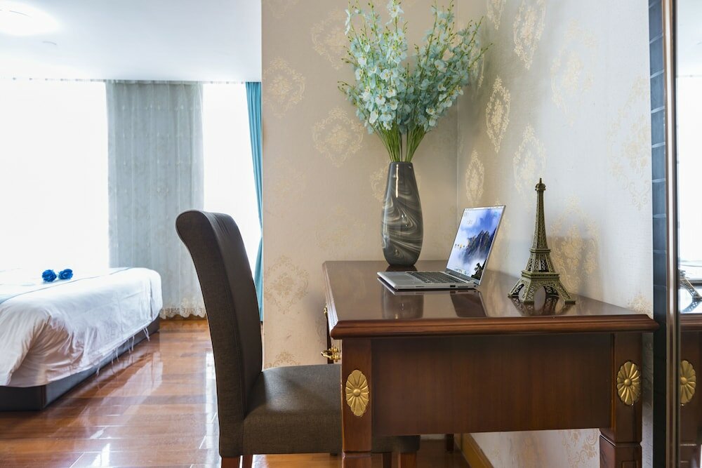 Фото Yoyo International Apartment