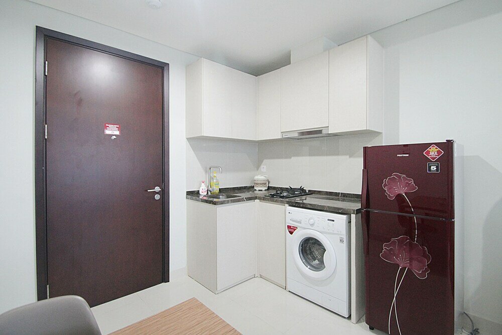 Фото Puri Mansion Apartment