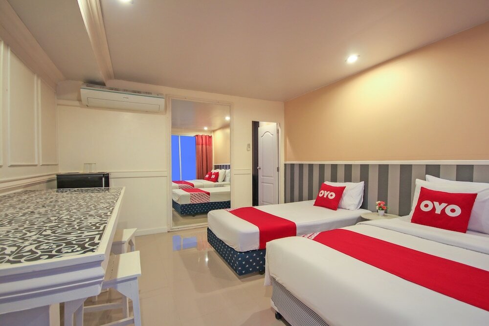 Фото Oyo 1117 Phuket Airport Suites