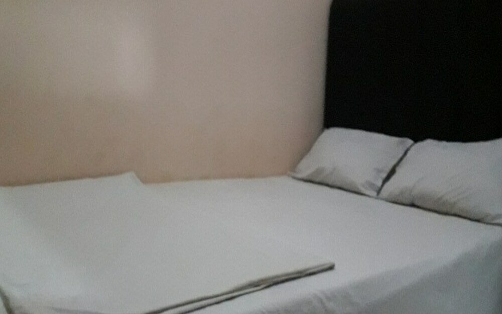 Фото Oyo 90706 Kost Alam Jaya Syariah