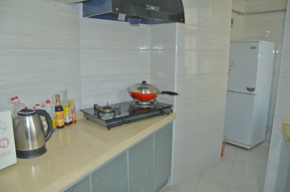 Фото Lanzhou Longshang Mingzhu Apartment Two-bedroom suite