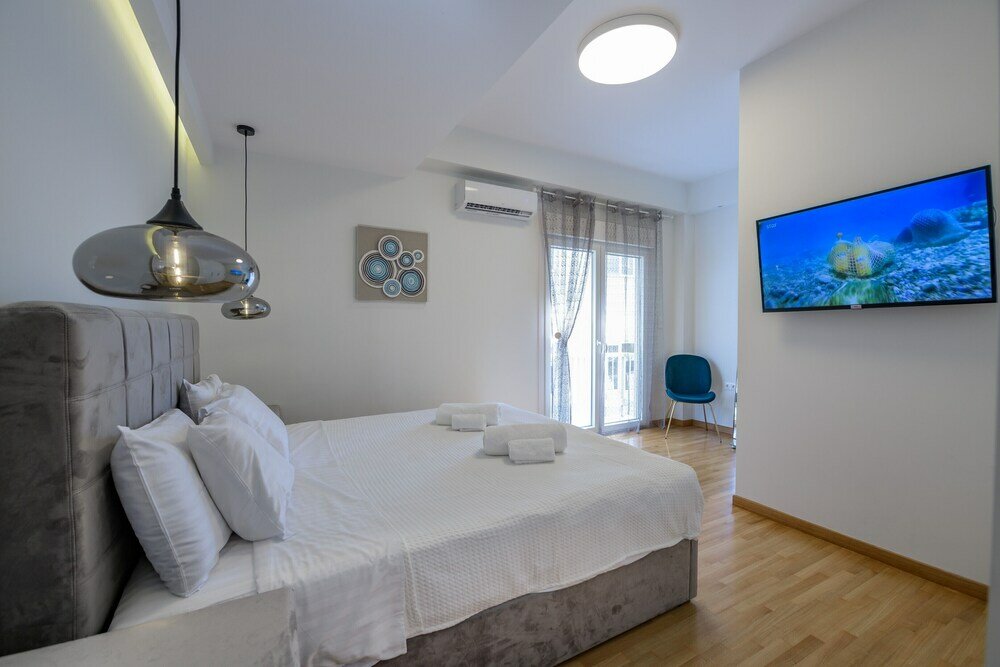 Фото Lush Sapphire apt in the heart of Athens