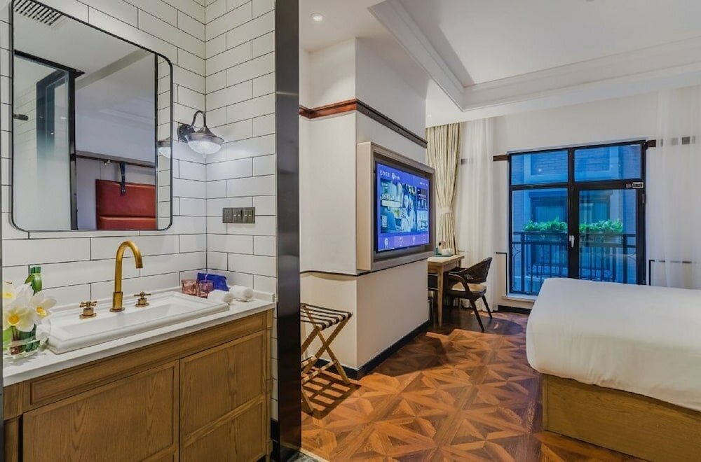 Фото Manxin Hotel Qingdao Zhanqiao