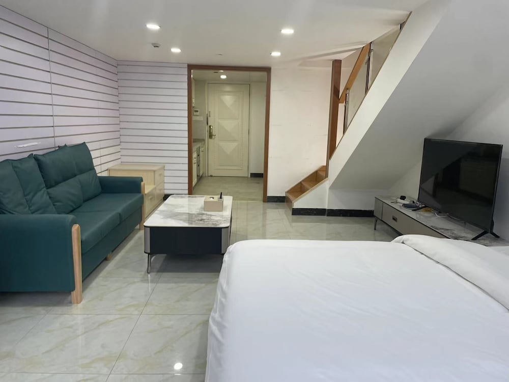 Фото Yoyo International Apartment
