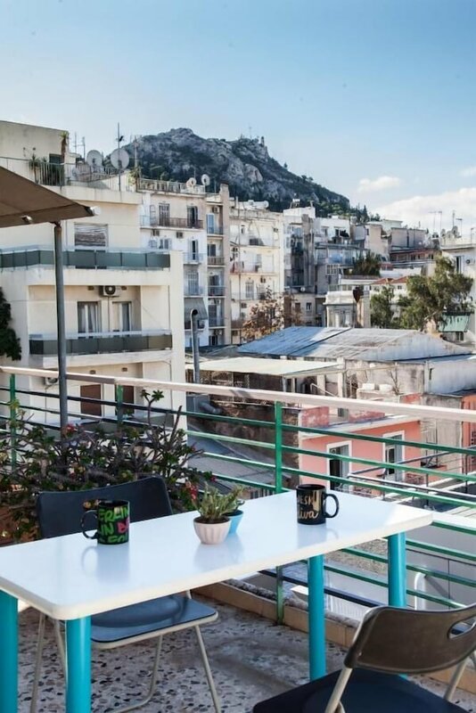 Гостиница Bright apt w lovely view in Lycabettus в Афинах
