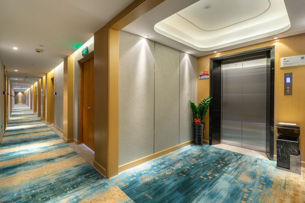 Фото Yì Wū Shì Bó Yì Měi Jū Hotel