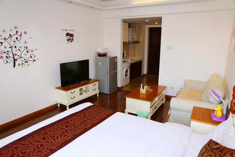 Фото Yue Ke Apartment