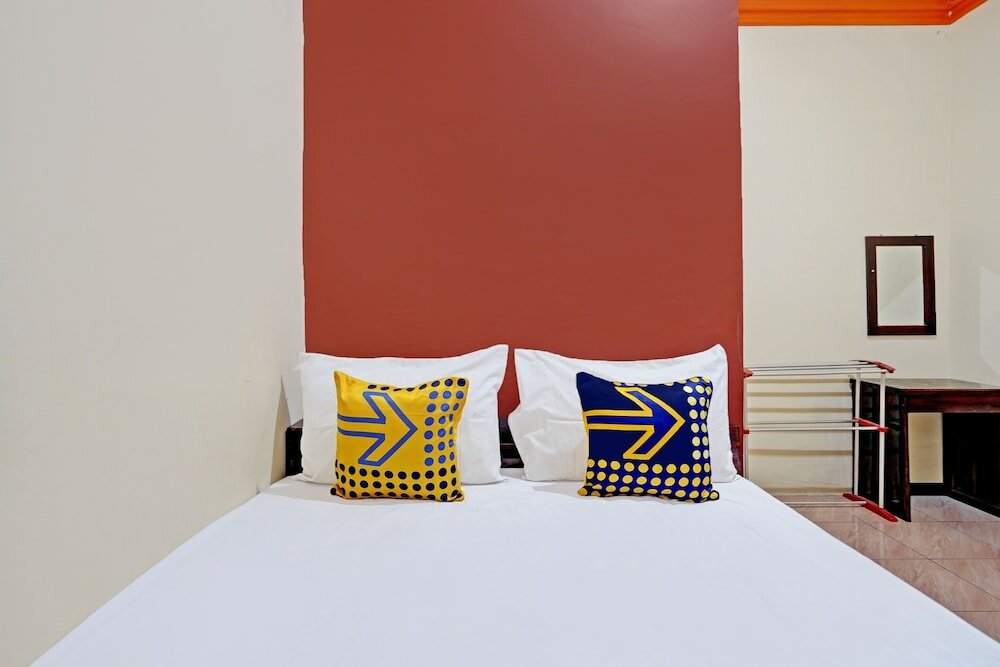 Фото Spot On 92527 Penginapan Kangean Syariah