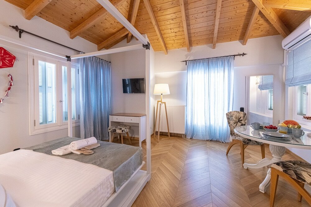 Фото Plaka Boutique Apartments