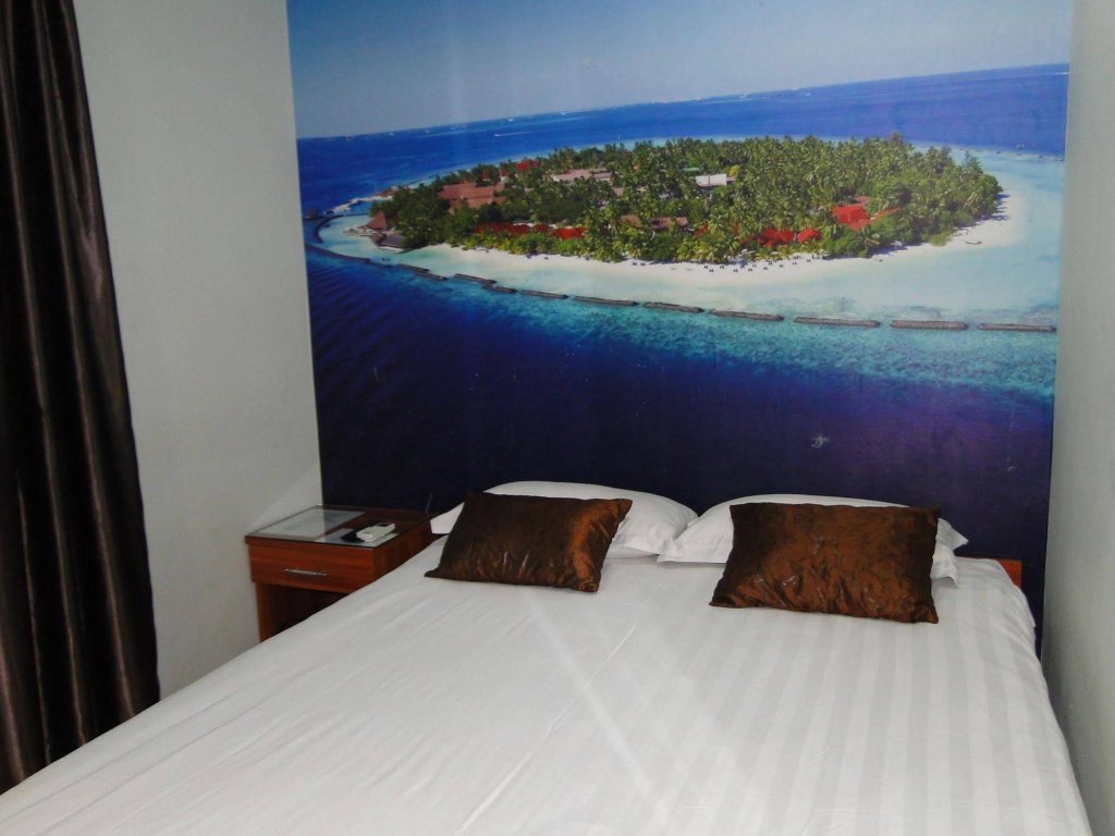 Фото Oyo 476 Rain Forest Hotel