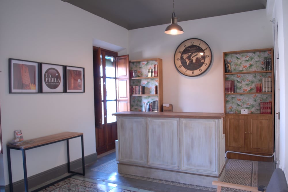 Фото La Perla Granada Suites