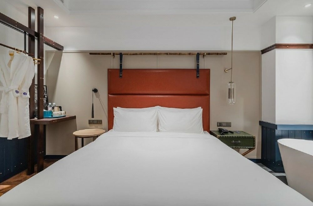 Фото Manxin Hotel Qingdao Zhanqiao