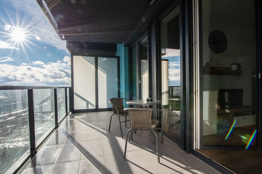Фото WaterFront City Apartments by UrbanRent