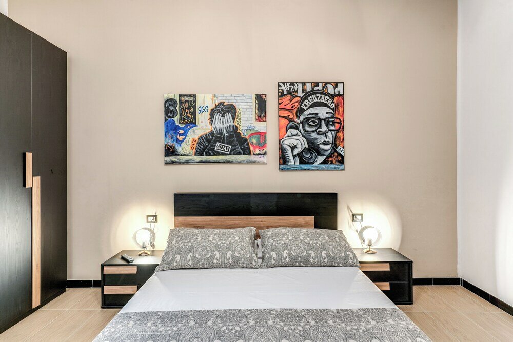 Фото The Quarters Naples Apartment