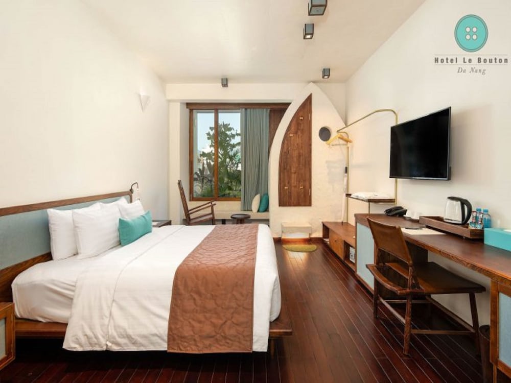 Фото Le Bouton Hotel