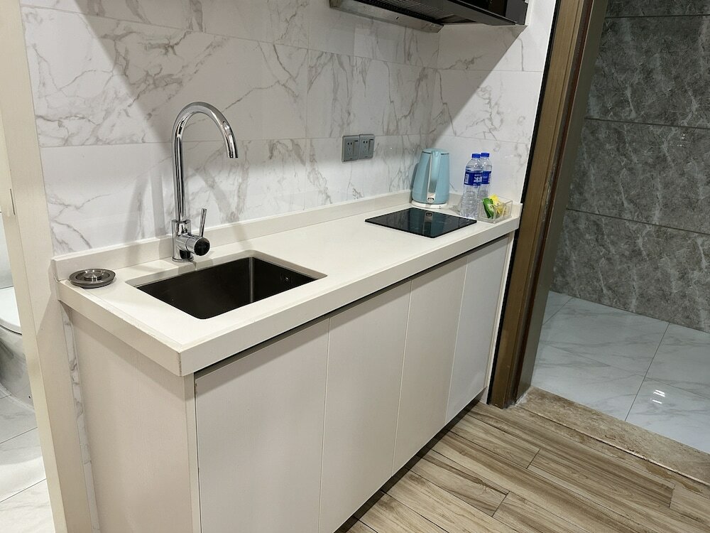 Фото Jinzhonghuan Serviced Apartment