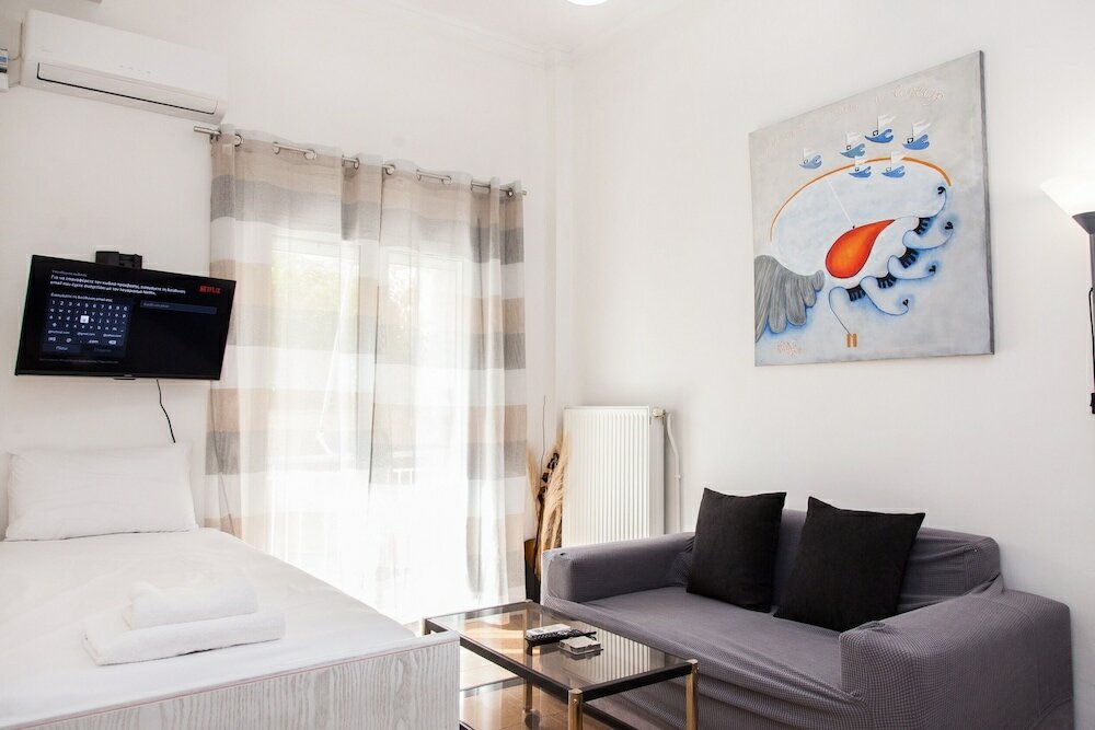 Фото Cozy apartment n Stavros Niarchos Park
