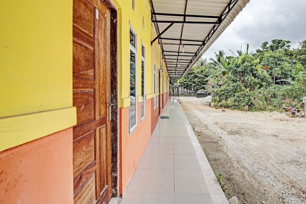 Фото Oyo 92223 Alfatar Homestay Syariah