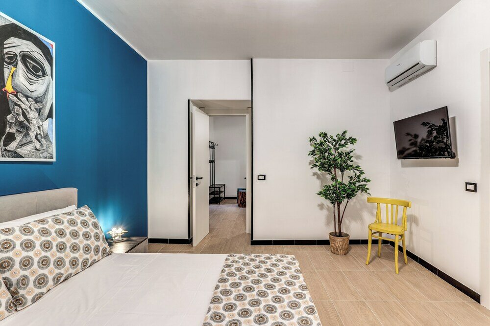 Фото The Quarters Naples Apartment