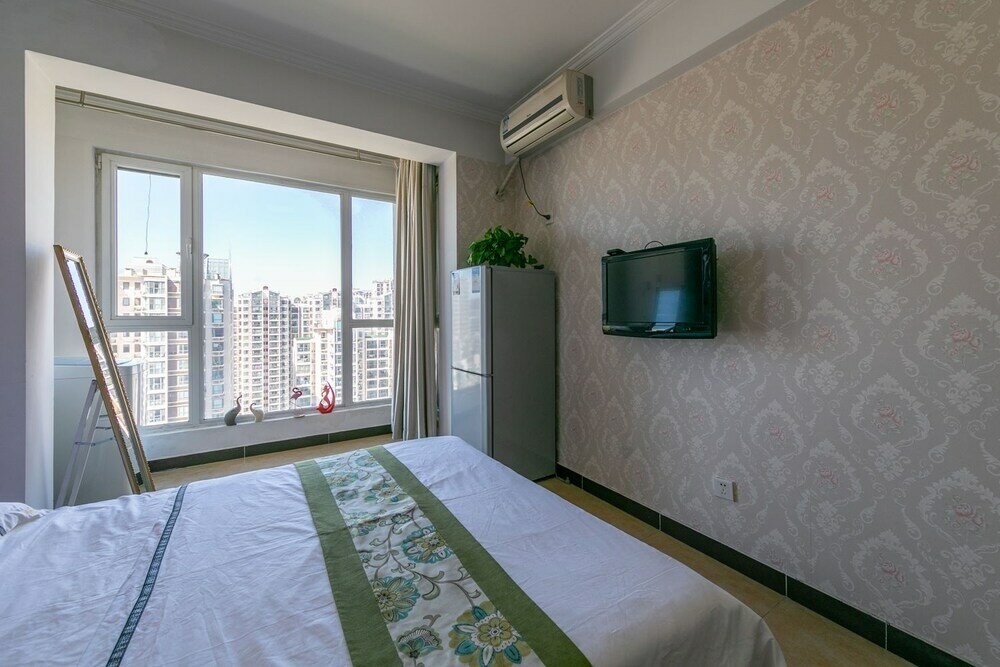 Фото Xiwangju Apart-hotel