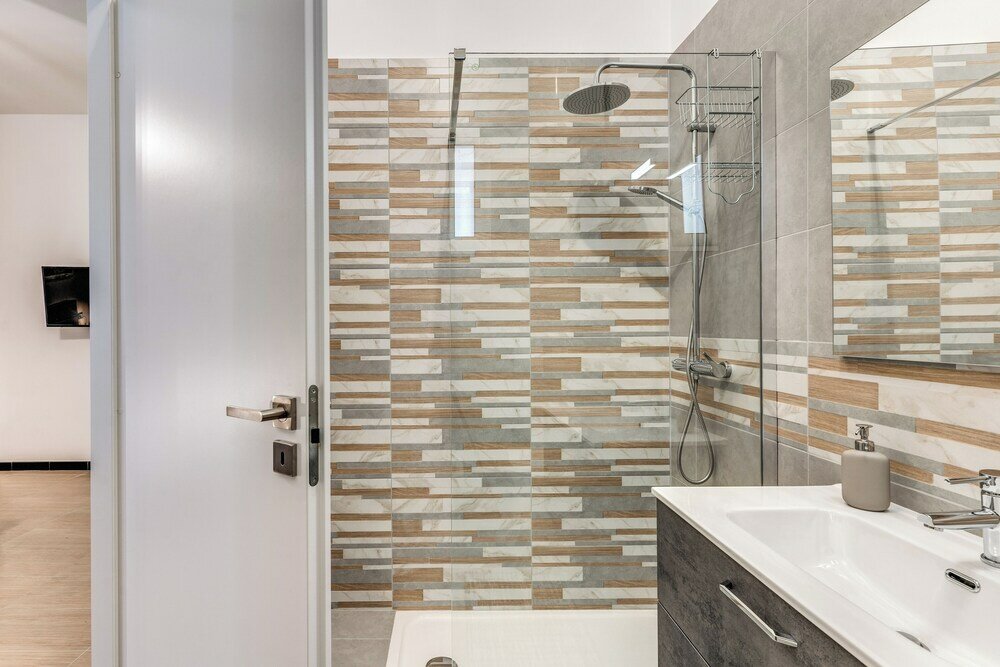 Фото The Quarters Naples Apartment