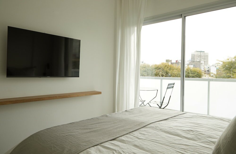 Фото Stylish 2-Bedroom Retreat in Palermo