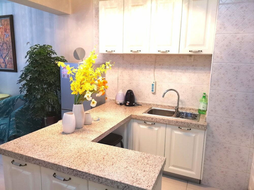 Фото Xiwangju Apart-hotel