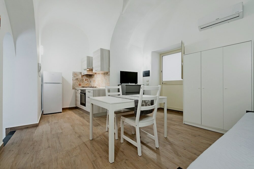 Фото Trinità 57 Apartments