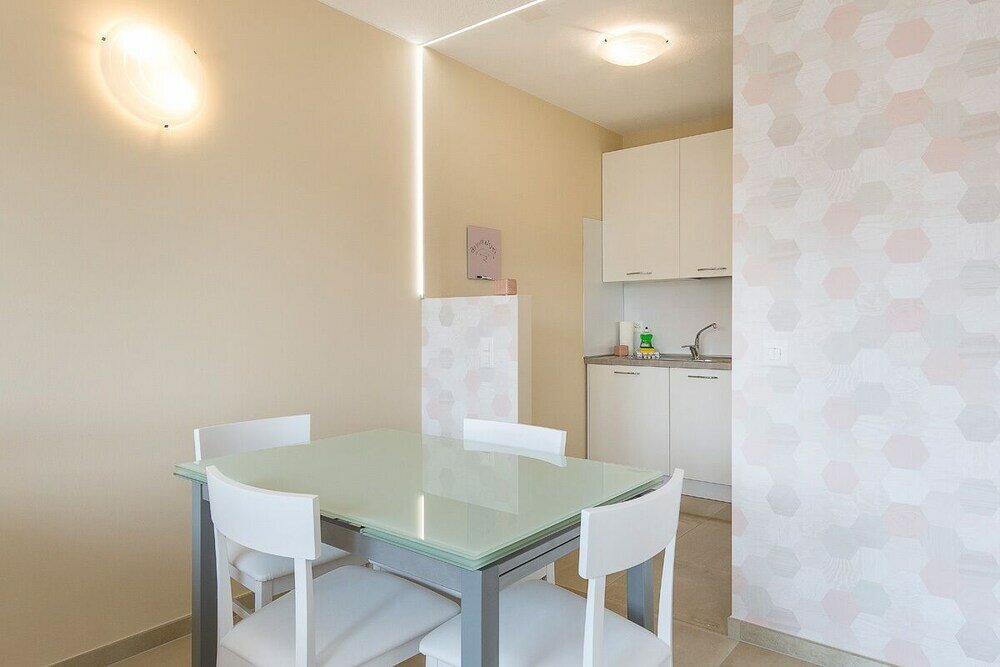 Фото Pazzallo Apartments