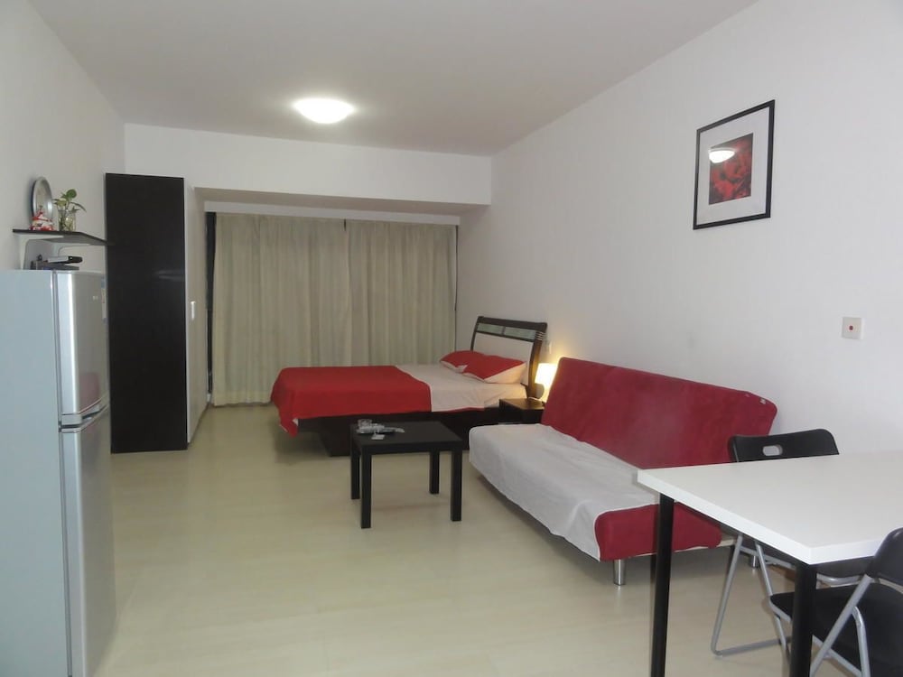 Фото Homehunter Short Term Apartment